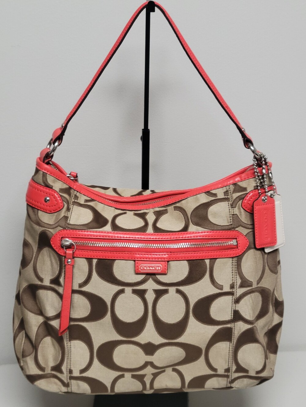 Coach Signature Canvas Shoulder Bag with Coral Trim.